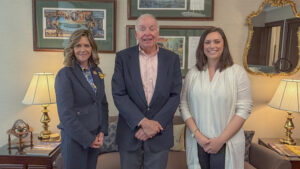 Sen. Bartolotta poses with John Lydon and Abby Wolensky of Auberle.