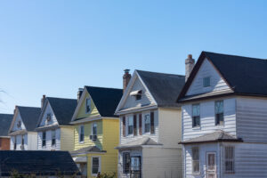 Row of Old Wood Homes on a street.