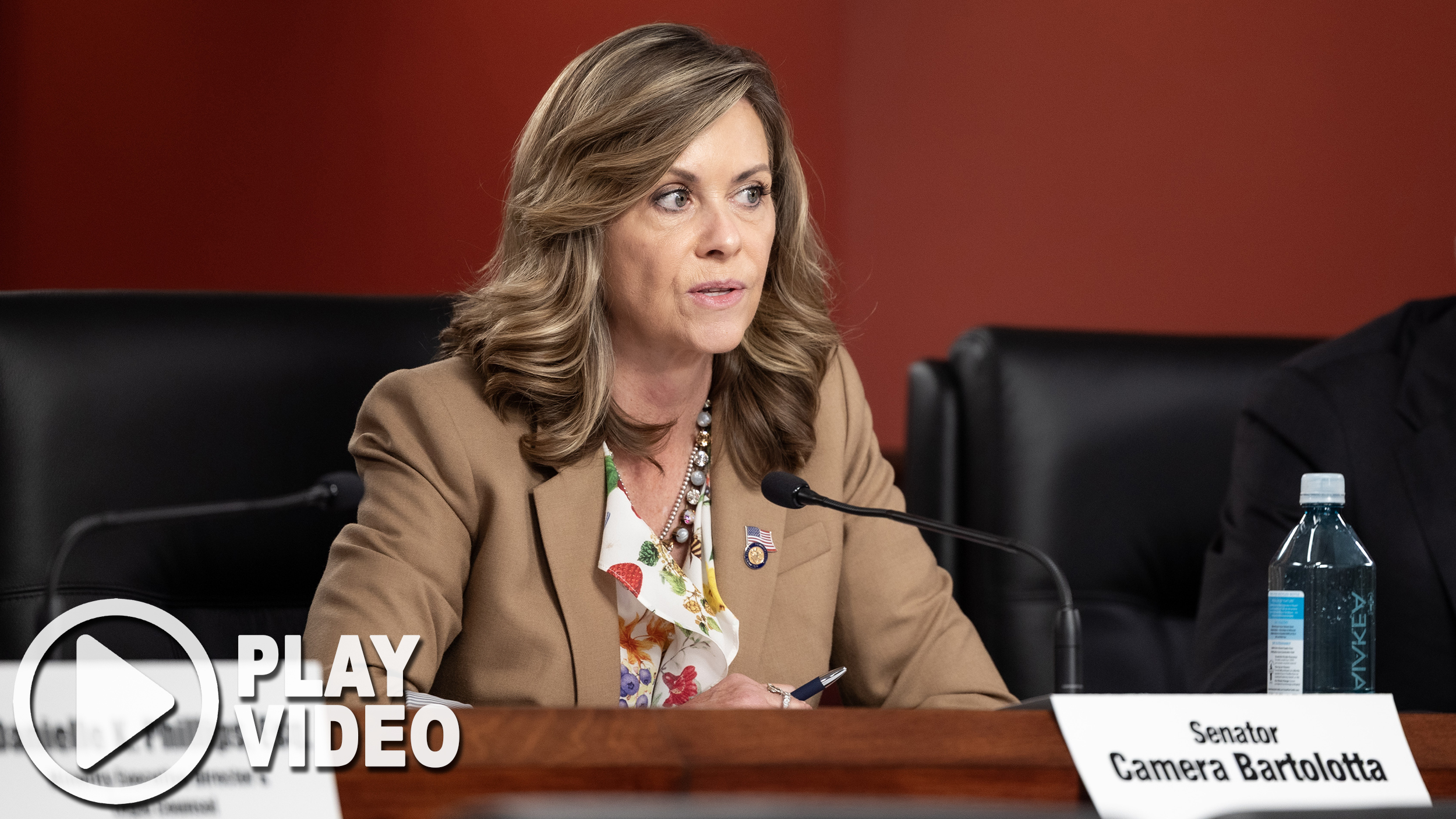 Sen. Bartolotta is sitting and speaking during a Senate Judiciary Committee at the State Capitol.