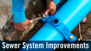 Closeup of hands tightening a bolt on a water pipe. There is text that reads, System Sewer Improvements.