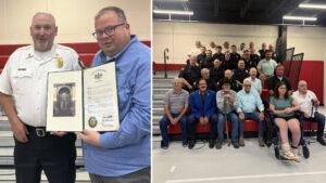 A montage of two pictures. On the left side is Eric Cowden presenting a Senate Citation of Congratulations to Fire Chief Kris Osecky, and on the right side is a group picture of members of the VFC.